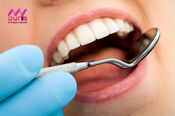 trồng răng implant có được bảo hiểm không